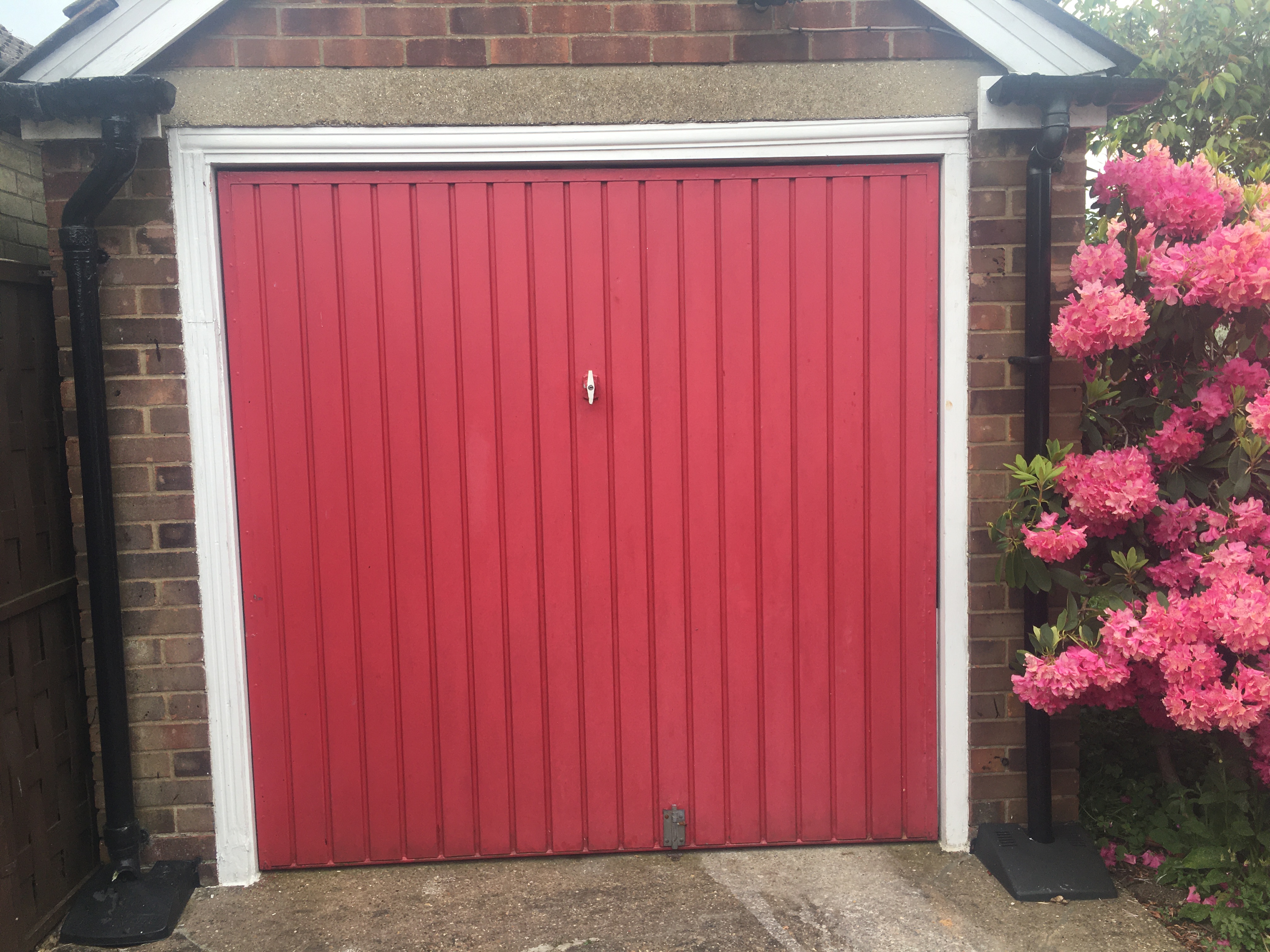 Garage door after repair — fully restored and working